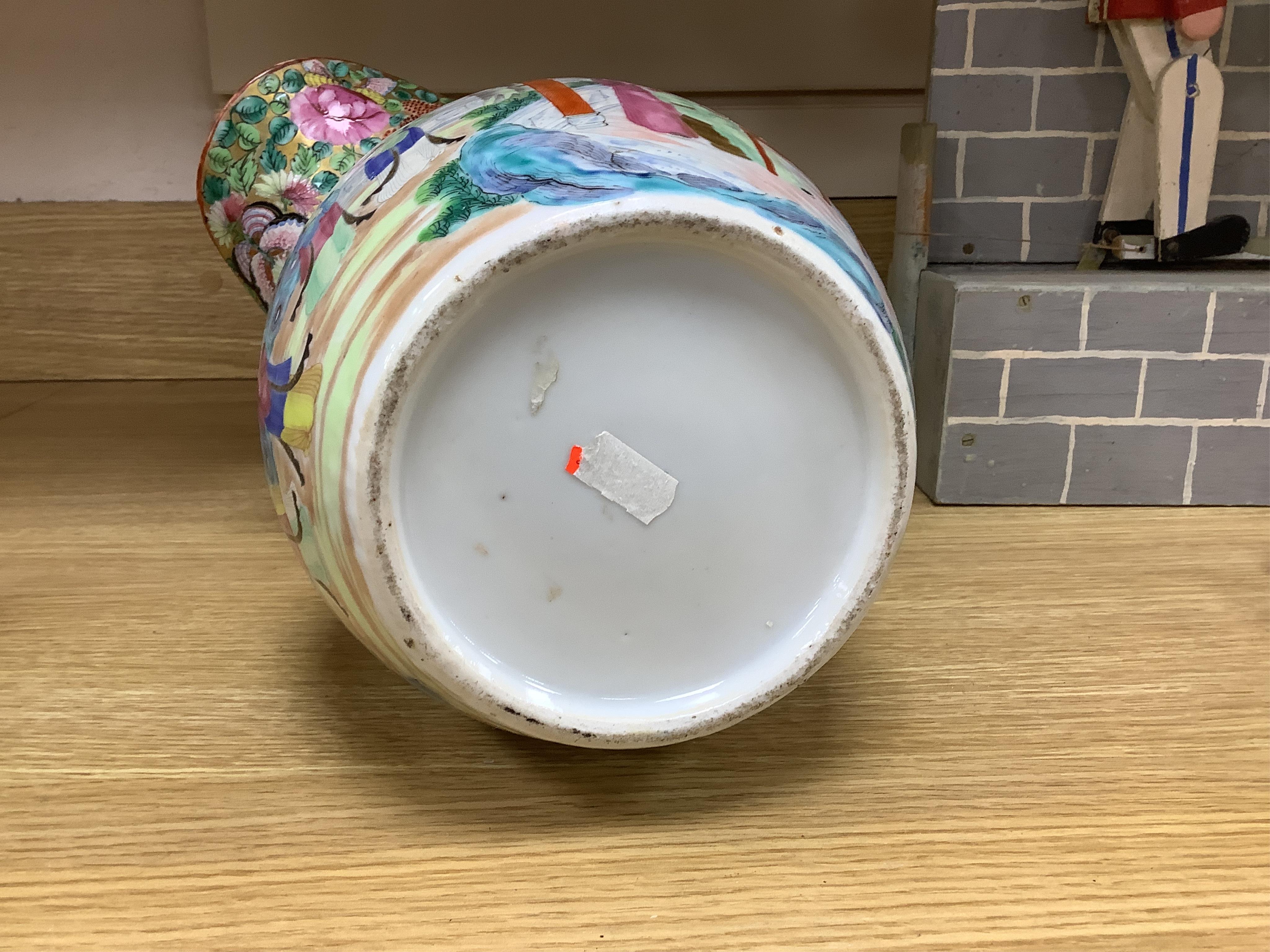 A Chinese famille rose jug, c.1830, 27cm